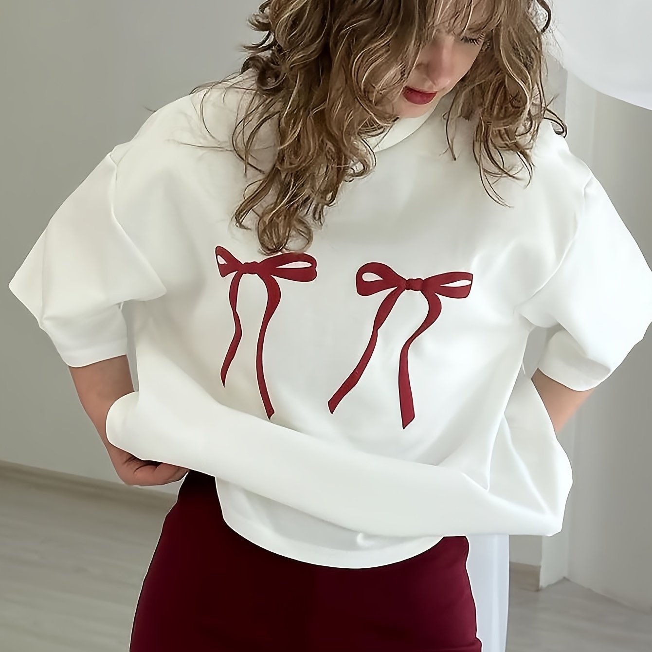 Women's T-shirt with a bow