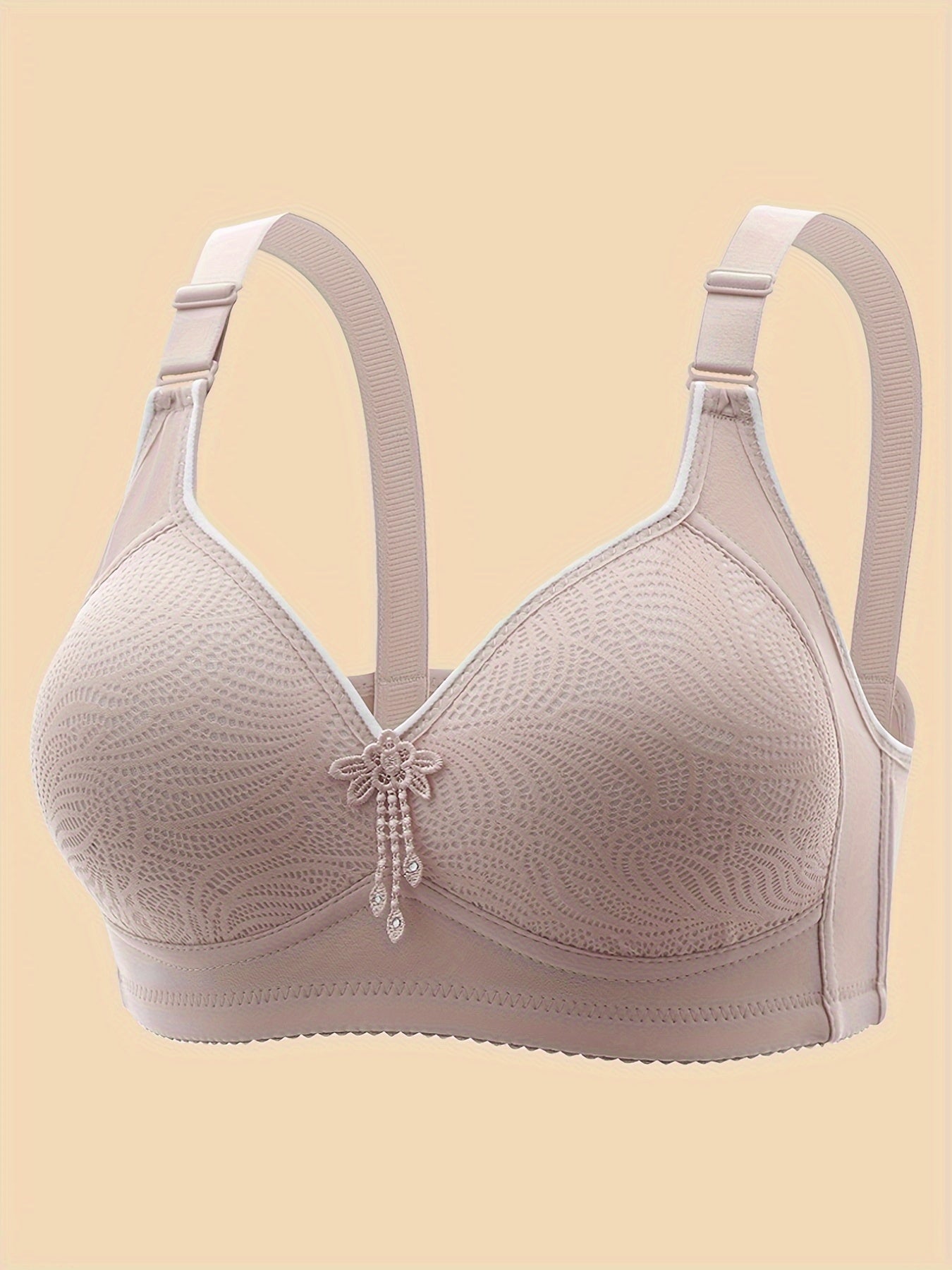 Solid seamless wireless tank bra with tassel decoration, providing sexy comfort and push-up support for women's lingerie.