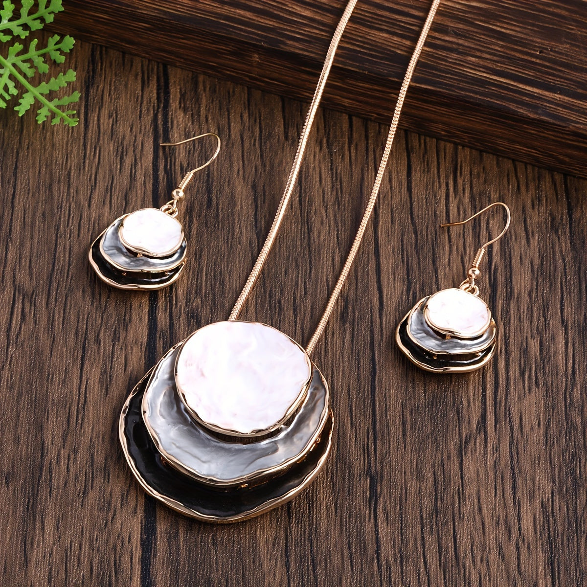 Chic and stylish Bohemian enamel jewelry set featuring a three-layer circular design made of zinc alloy. This adorable set makes a perfect gift for the special ladies in your life, ideal for holiday parties or as a girlfriend gift. Includes a necklace