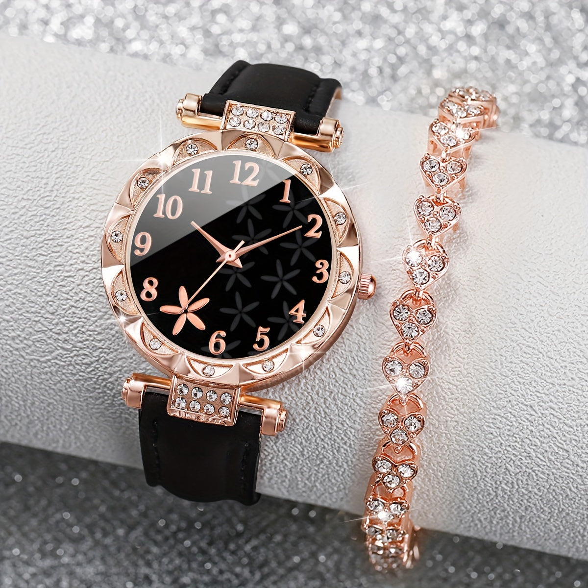 Set includes a women's fashion watch with bracelet. Features digital quartz movement, round alloy case, PU leather strap, and non-rechargeable battery. Watch box not included.