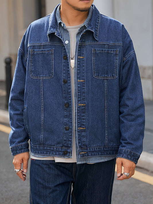 Men's plus size denim jacket in solid washed blue with long sleeves, chest pockets, button-front closure, and loose fit. Machine washable for everyday casual streetwear style with trendy