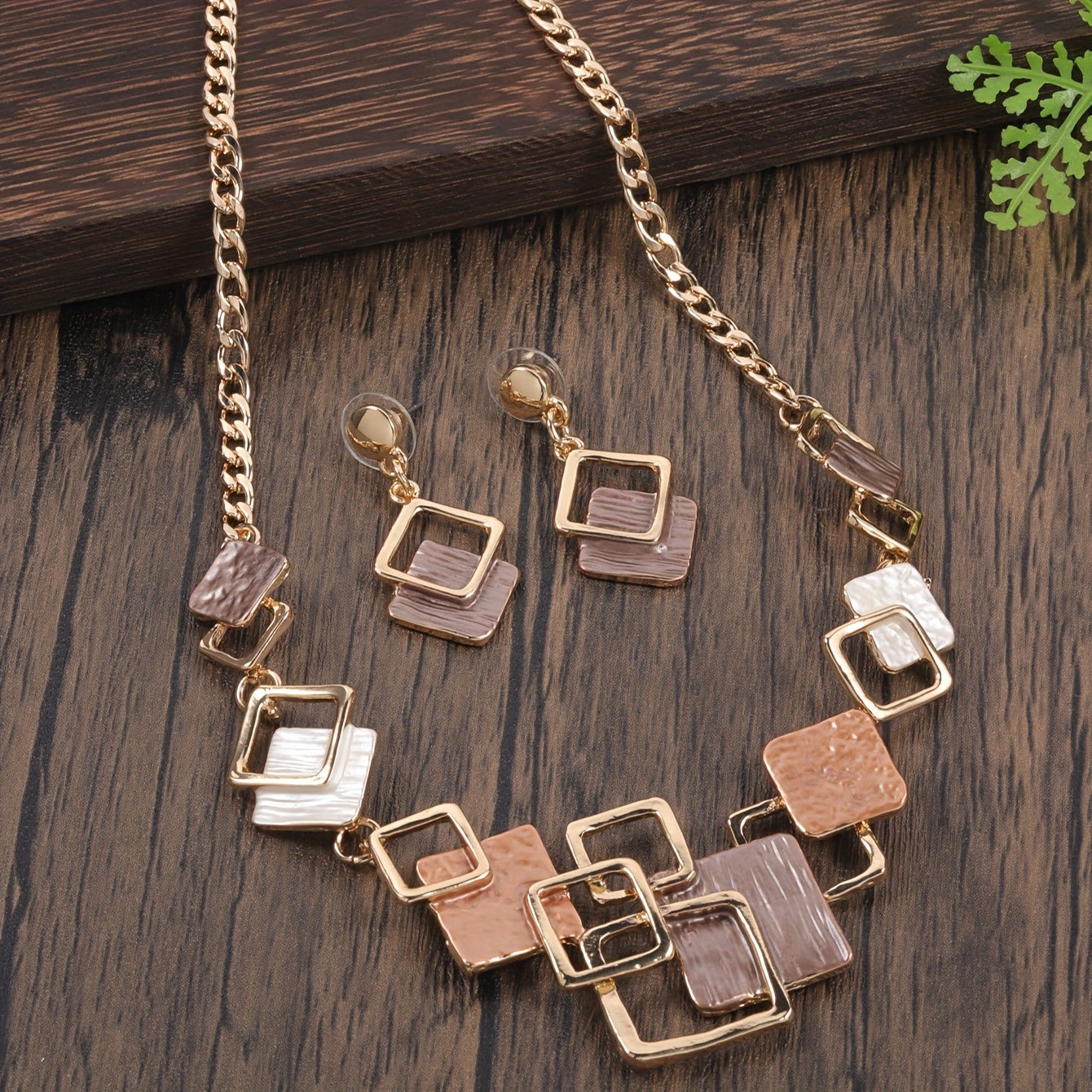 One trendy geometric design jewelry set includes one pair of earrings and one necklace in boho style, perfect to match with daily outfits or as a party accessory. Made from enamel, this set is a must-have addition to your jewelry collection.