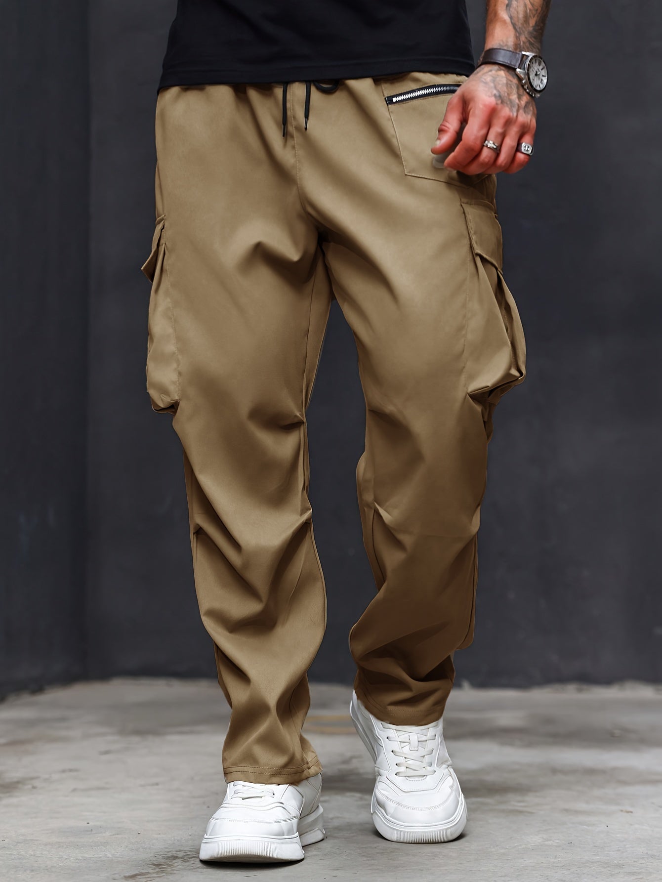 Plus size men's cargo pants with athletic and casual style, regular fit and pockets.