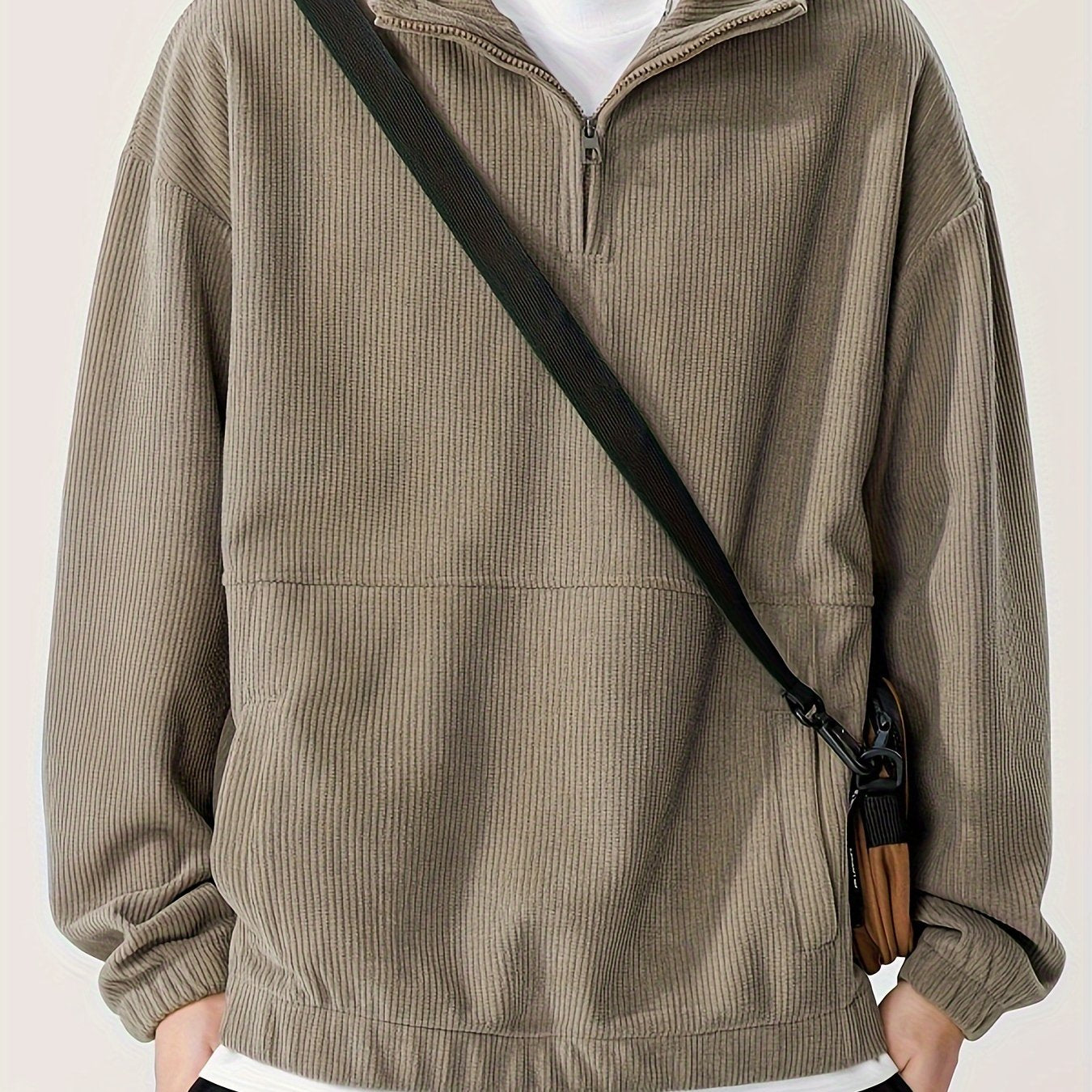 Men's cozy knit zip-up hoodie with dropped shoulder sleeves for casual wear.