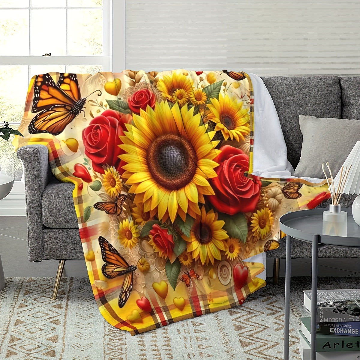 This versatile Sunflower and Butterfly Print Flannel Fleece Throw Blanket is the perfect addition to your home decor. With its reversible design, tear-resistant construction, and all-season functionality, this blanket combines contemporary style with