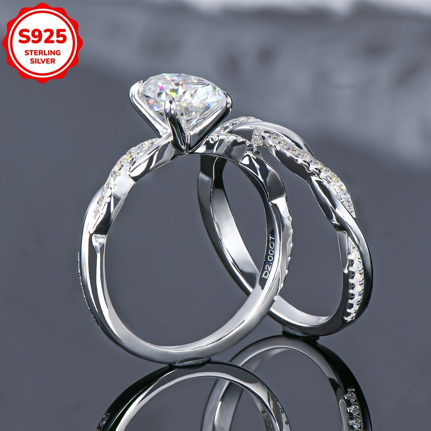 Weight: 5.48 grams, Main Stone: Oval 7x9mm Moissanite, Main Stone Weight: 2 carats, Set of 925 Pure Silver Women's Rings featuring a Moissanite main stone. The set includes a Moissanite Wedding Ring, Women's Wedding Ring, Engagement Ring with a twist arm