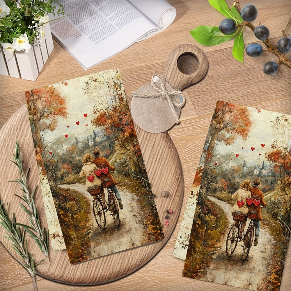 2 Pieces of Ultra Soft Kitchen Towels featuring a couple riding a tandem bicycle decorated with heart-shaped bells down a country lane. These highly absorbent dish hand towels are perfect for holiday decor. They are machine washable and measure 16x24