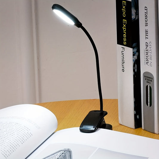 Portable LED book light with adjustable arm, push button control, and polished finish. Battery not included.