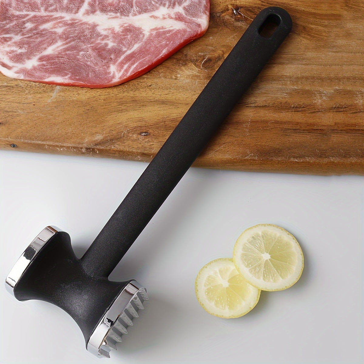 One piece of Zinc Alloy Meat Hammer, a versatile Metal Meat Pounder for household use. This Meat Tenderizer Tool is perfect for knocking meat into tender perfection in the kitchen. Also known as a Meat Tenderizer Hammer, it is a must-have among Kitchen