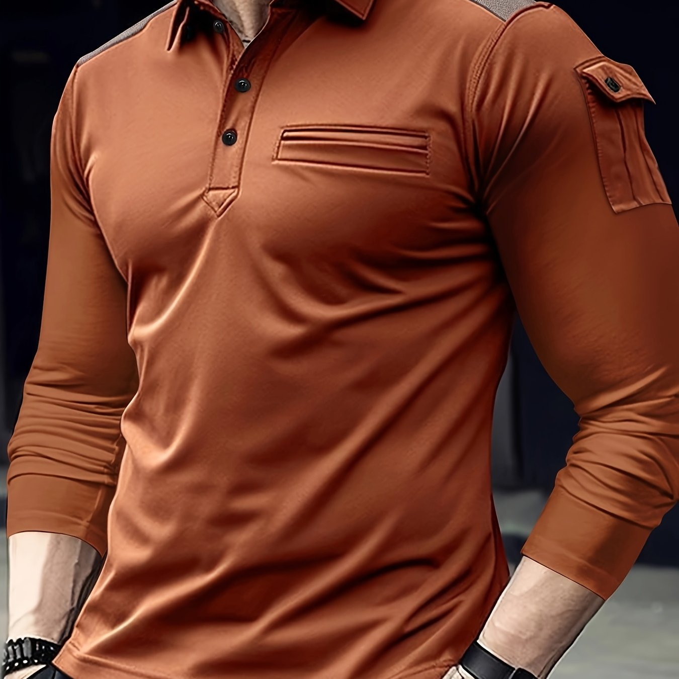 Long-sleeve men's casual shirt with arm pockets and shoulder patches, perfect for outdoor sports in the Fall/Winter Collection.