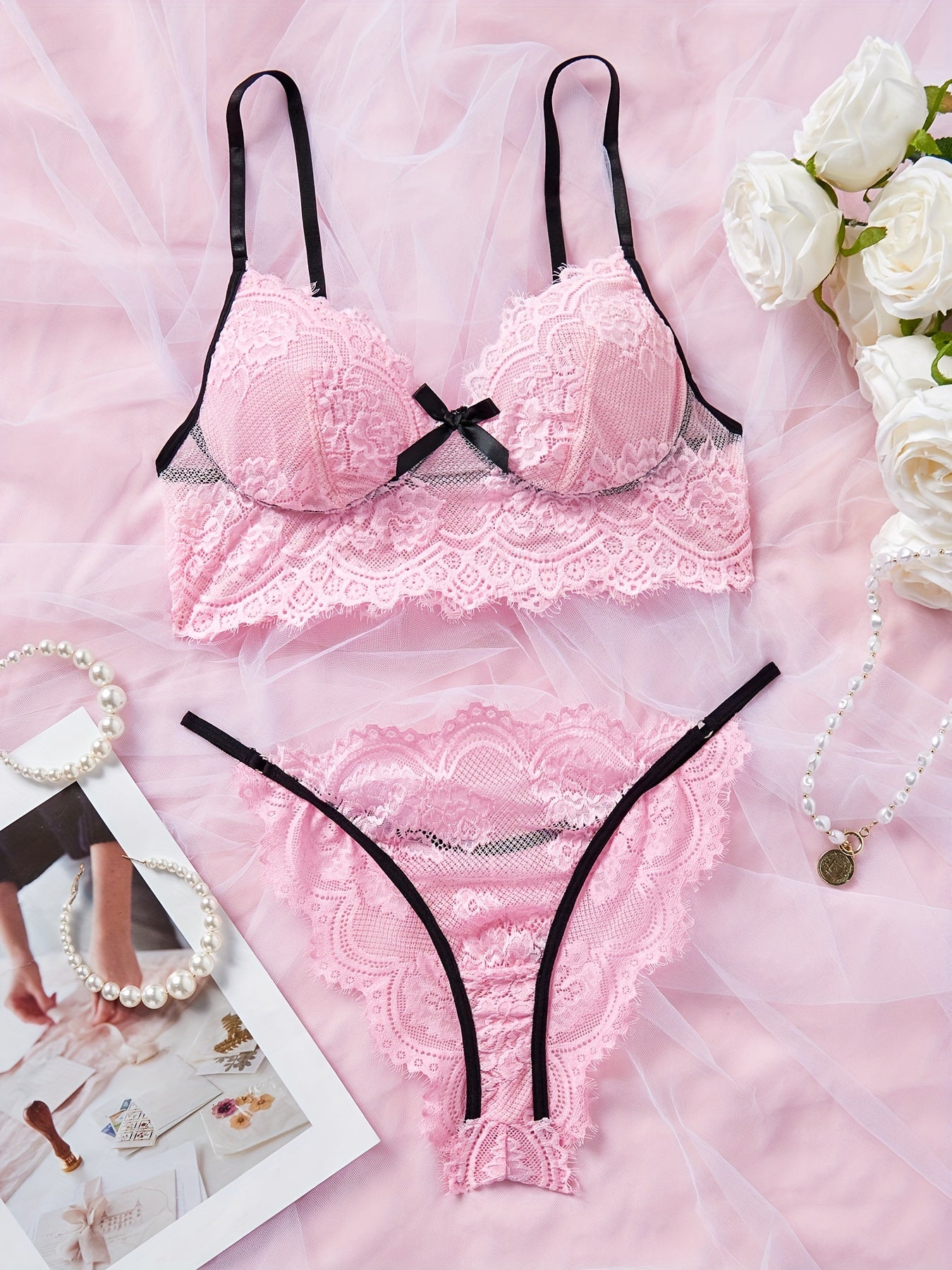 Sexy lace lingerie set with contrasting colors.