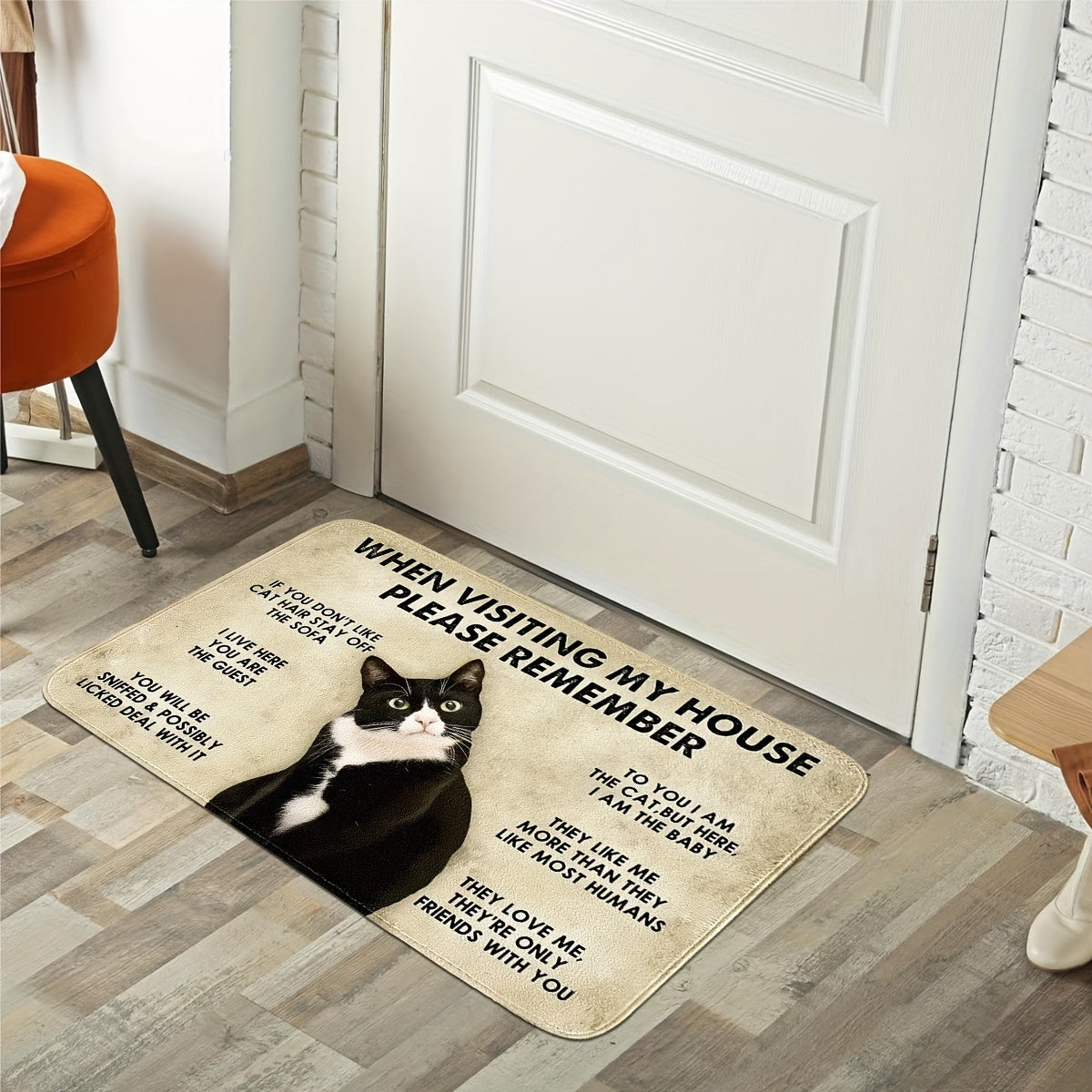 Welcome cat lovers with this non-slip polyester doormat featuring a cute cat print. This machine washable mat is lightweight and has a knit weave, making it perfect for use in the bathroom, entrance, hallway, or bedroom. Made from comfortable soft