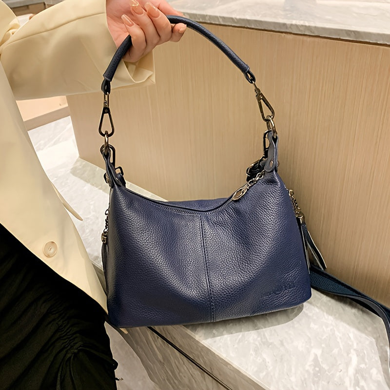 Women's genuine leather shoulder bag with large capacity, adjustable strap, zipper closure, casual style in black or blue. Ideal for daily commute, shopping, and travel gifts.