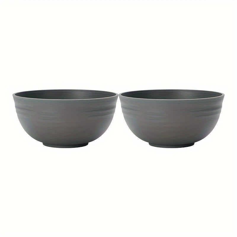 Durable plastic bowls safe for microwave use, perfect for meals at home or on-the-go. Offered in sets of 2, 4, or 6.