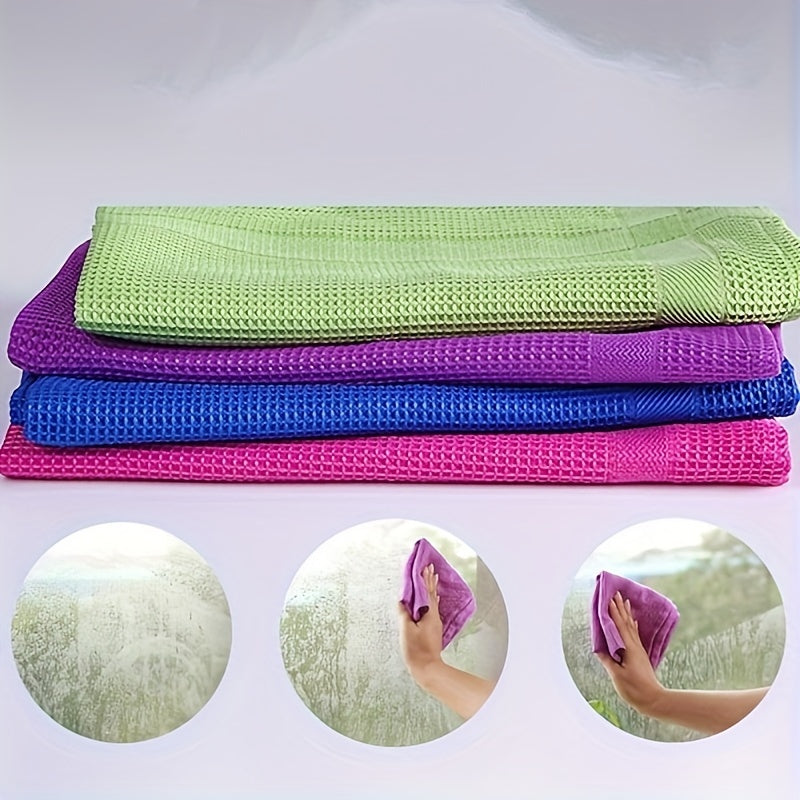 Two pieces of highly absorbent microfiber cleaning cloths measuring 40.64x40.64 cm each. These cloths are specifically designed to leave glass and mirrors streak-free, as well as lint-free kitchen towels. Perfect for cleaning multiple surfaces around the