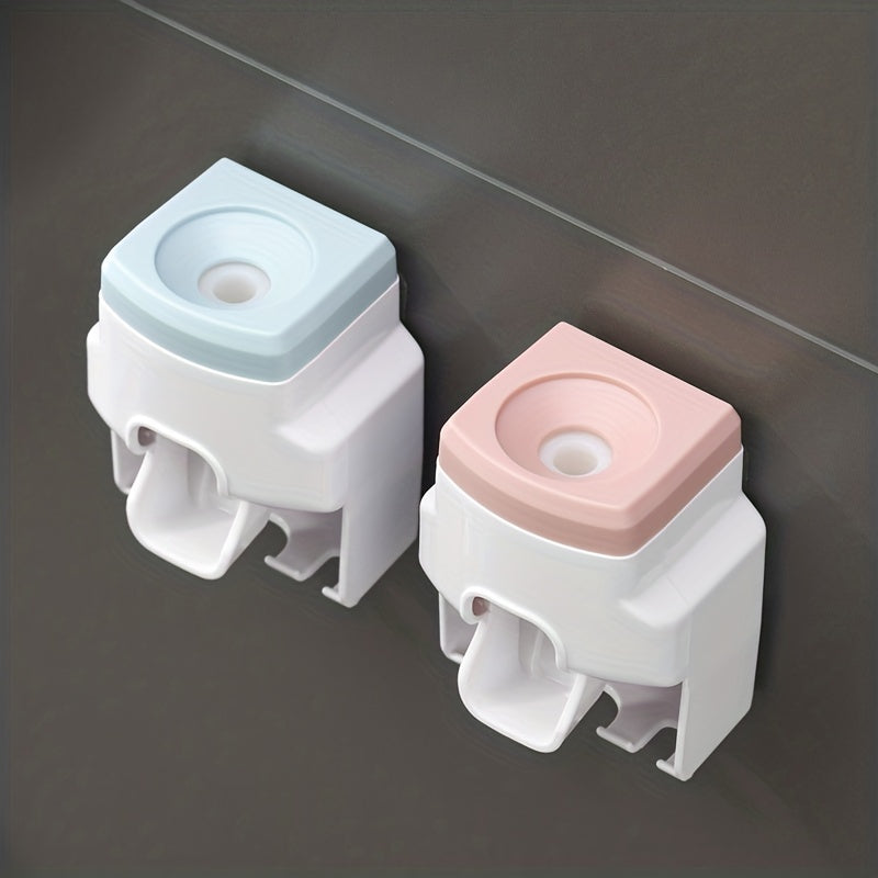 Wall mounted toothbrush holder and toothpaste dispenser with automatic squeezer, ideal for family washroom.