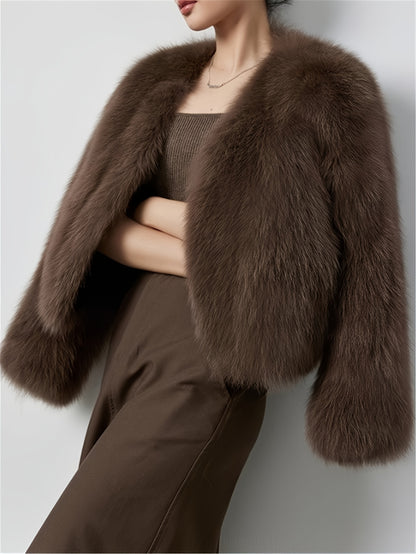 Elegant faux fur trim jacket in light beige/blonde for women. Made of soft polyester material, perfect for cold weather. Features a chic style with long sleeves and classic collar design.