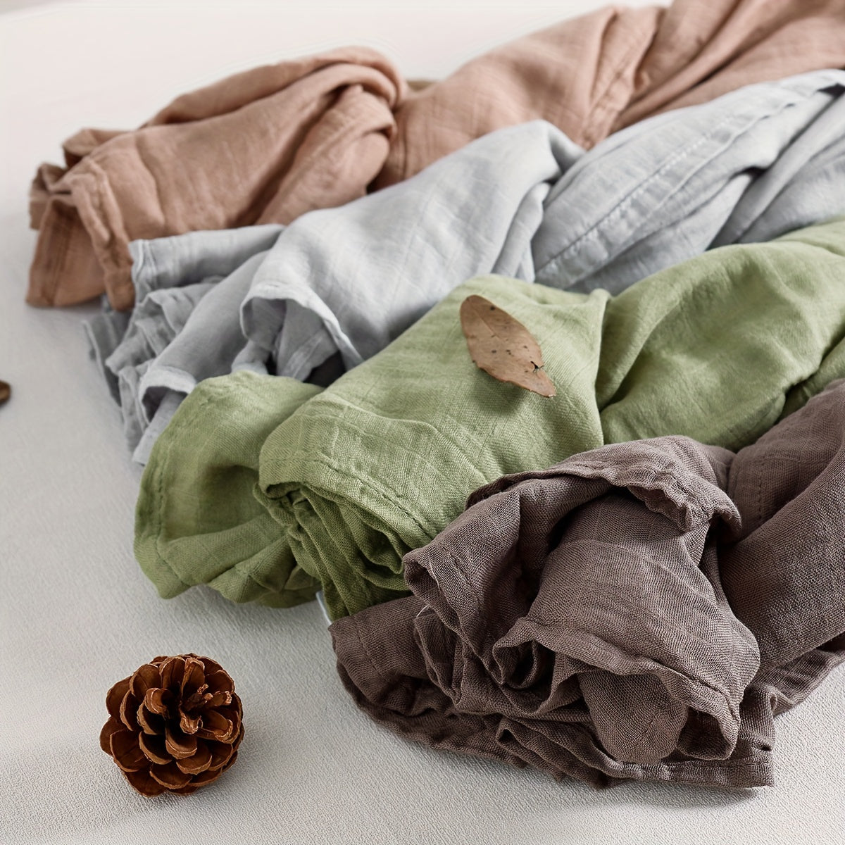 Soft and breathable, the Plain Color 1pc Muslin Blanket from Happyflute features a 2-layer thermal design that makes it perfect for both fall and all-season use. This lightweight throw blanket is made from gauze material, providing comfort and warmth