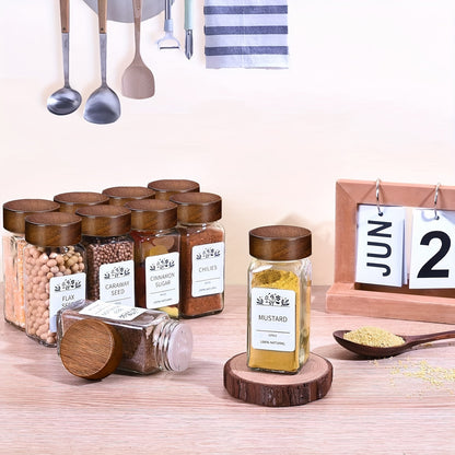 Set of 6, 12, or 24 glass spice jars with sandalwood lids. Each jar holds 120ml and comes with labels for kitchen organization.