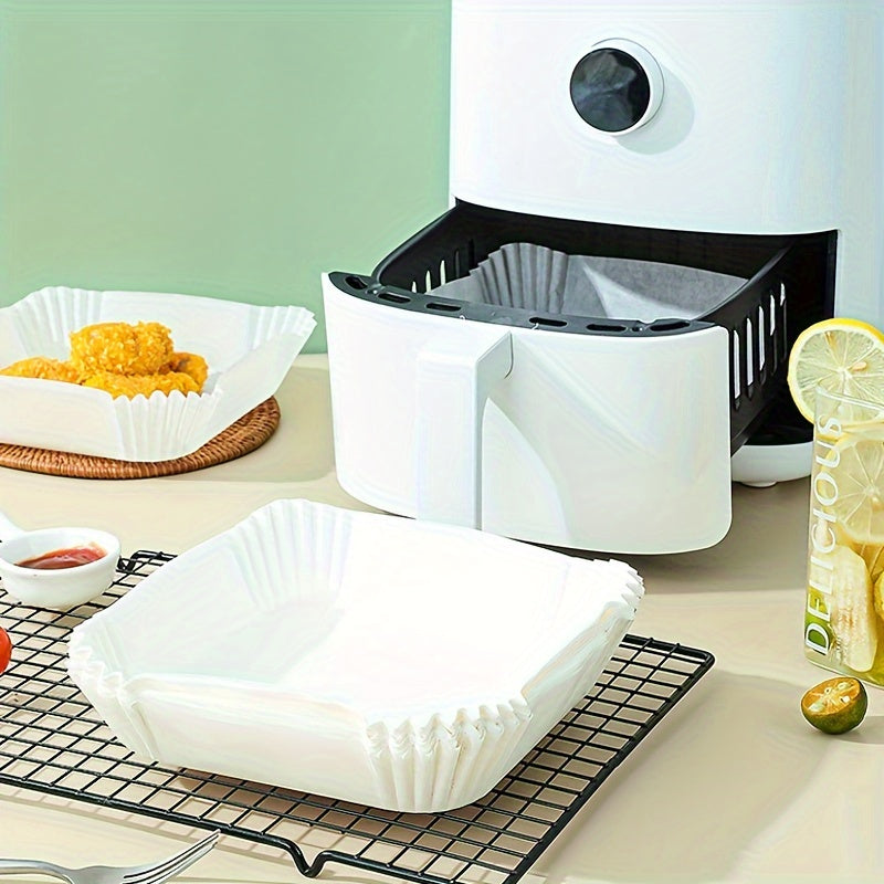 50 to 100 pieces of disposable air fryer liners in sizes 16.0cm and 19.99cm for the bottom of your air fryer. These square paper liners are perfect for air fryer pots, basket bowls, baking trays, and oven accessories. They are essential baking tools and