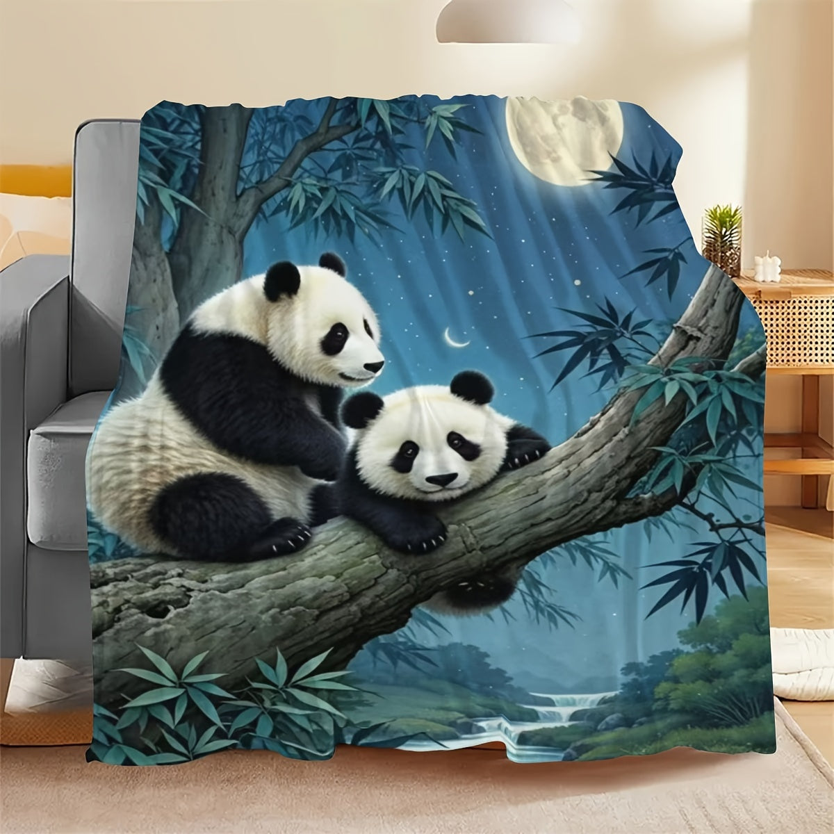 Soft and cozy all-season flannel throw blanket featuring a panda print on a moonlight scene. Perfect for gifting on holidays, birthdays, and Christmas. Made of 100% polyester, this blanket is perfect for bed, sofa, living room, or bedroom decor. Enjoy