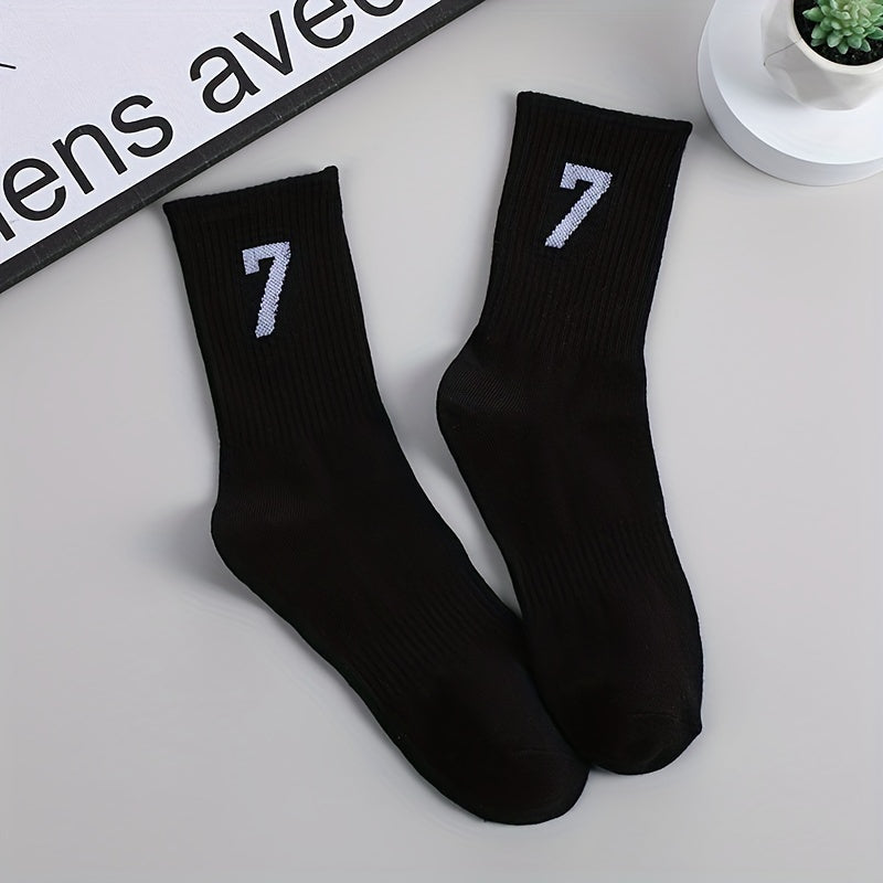 3 pairs of men's mid-calf socks with 17.78cm trendy design in black, white, and gray colors. Made of soft polyester/spandex blend, breathable and sweat-absorbent. Casual athletic wear