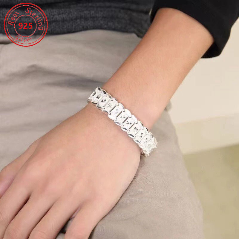 This elegant 12mm Coin Wide Bracelet is made of S925 Sterling Silver, ideal for daily wear or special occasions. With its simple and stylish design, it is allergy-resistant and perfect as a fashion jewelry gift.