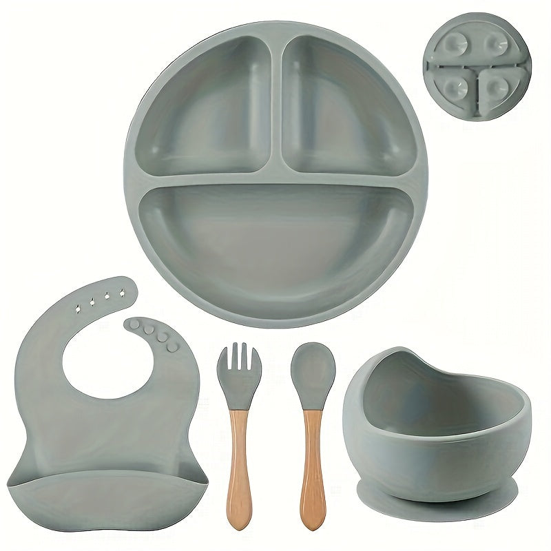 Set of 5 Baby Silicone Tableware including a fork and spoon with wooden handles, silicone bowl, divided plate, and waterproof bib. Conveniently washable and an essential addition to any household.