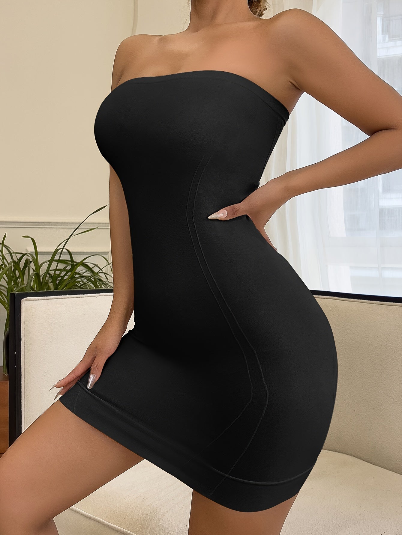 Women's shapewear bodysuit dress with seamless nylon knit for slimming and lifting, lightweight fabric.