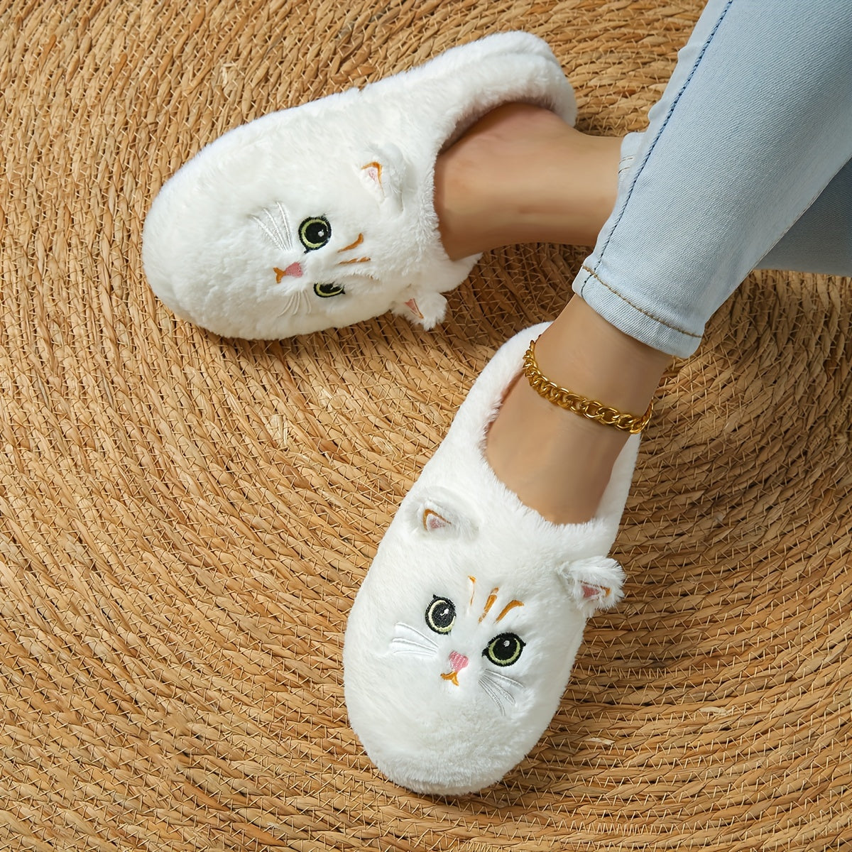 Cozy cartoon cat eyes winter plush slippers with soft sole, fluffy material, and hand washable. Perfect for cold weather and comfort. Ideal for indoor use.