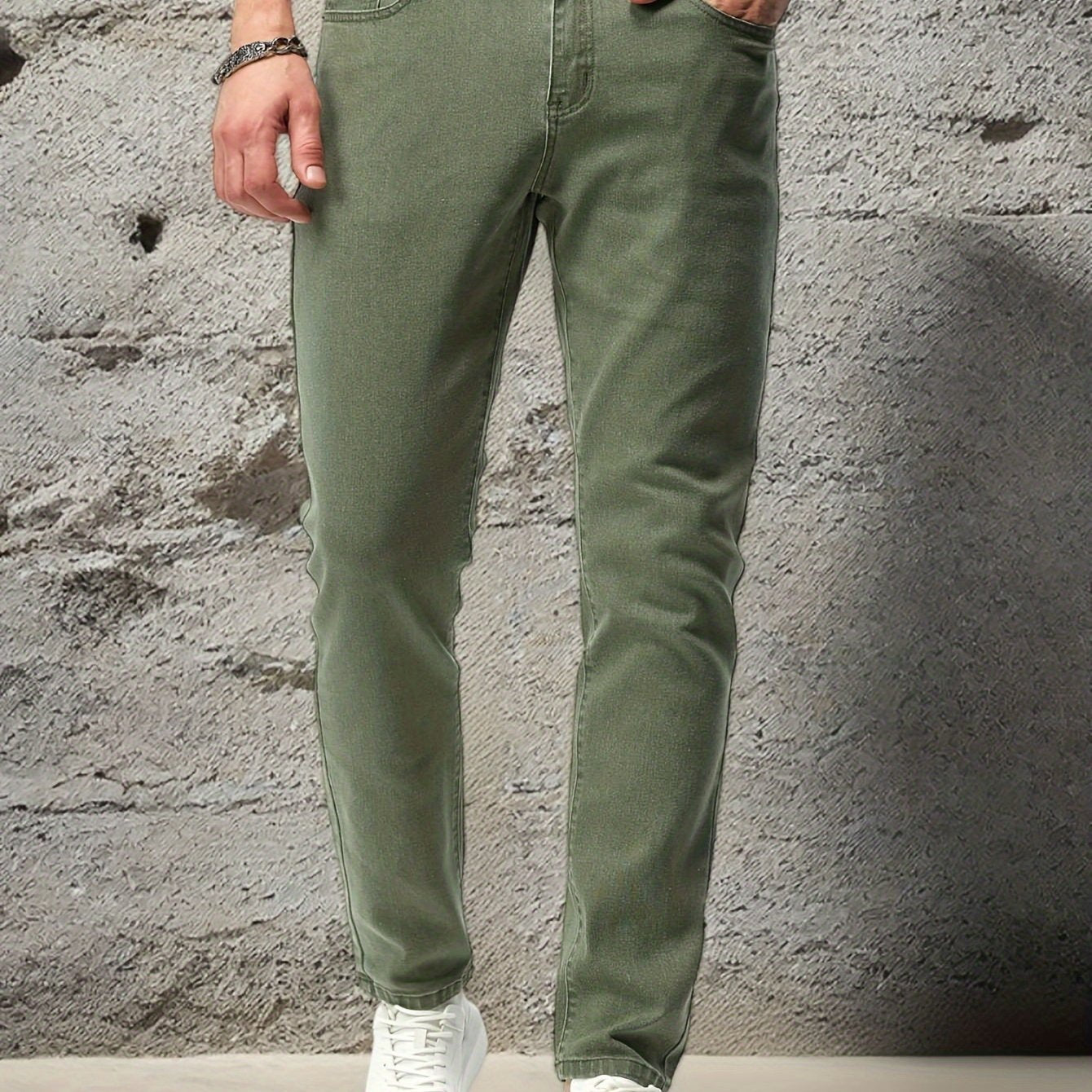 Stretchy denim jeans for men, ideal for casual outdoor wear.