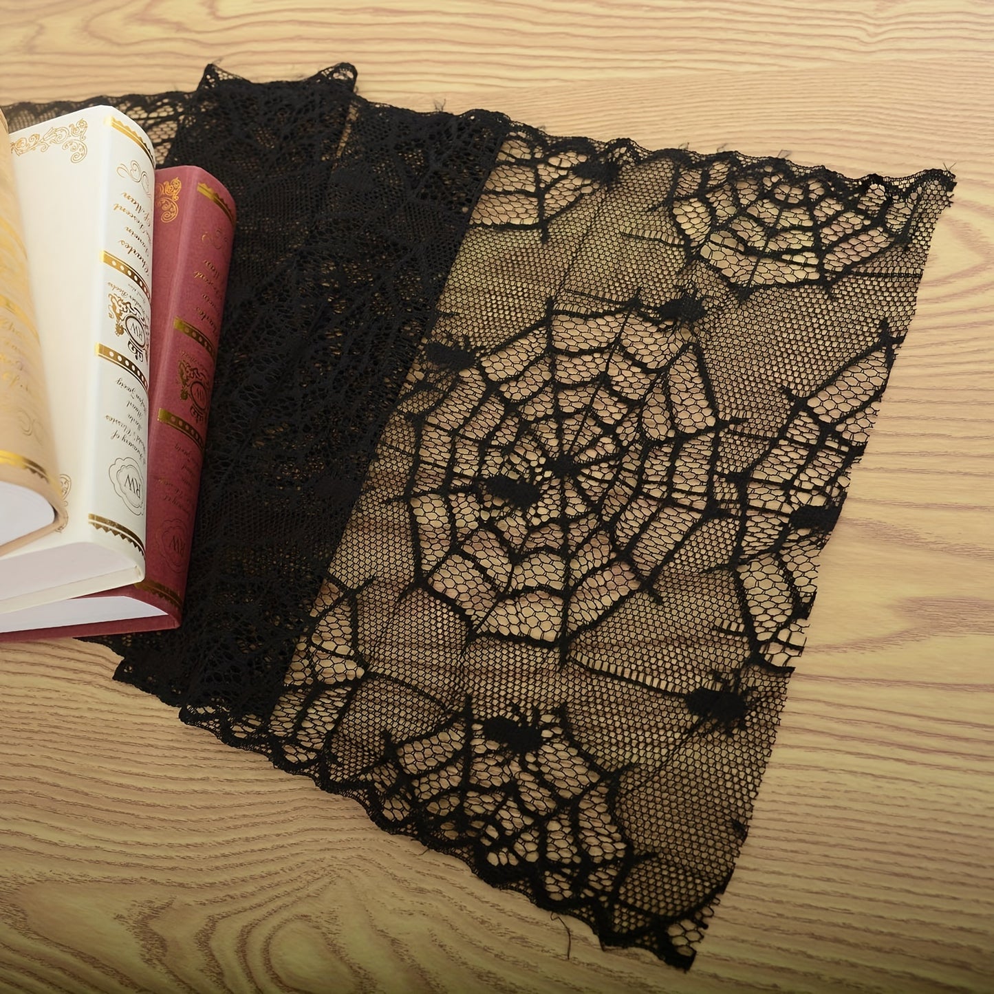 1pc Halloween table runner featuring a black lace design with a ghost theme. Perfect for decorating tables for Halloween, parties, and holidays. Great for adding a spooky touch to your home décor or as a gift.