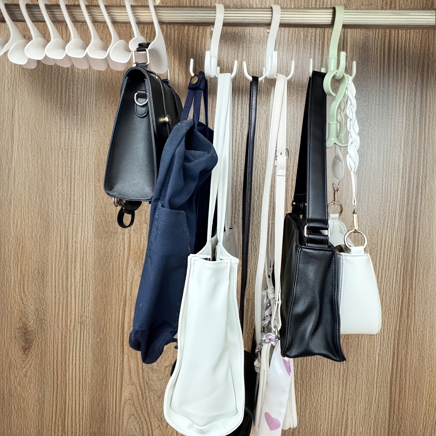 This multifunctional wardrobe set includes 14 pieces of widened design hooks, perfect for storing bags and clothes. The rotating hooks can be used for various purposes, making it a versatile addition to your storage solutions.