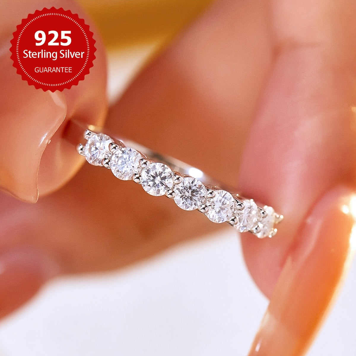 This exquisite Moissanite stone ring features 7 stunning stones set in 925 sterling silver, specifically designed for women. It can be used as an engagement ring, an eternal ring, a promise ring, or a luxurious anniversary gift. The total weight of the