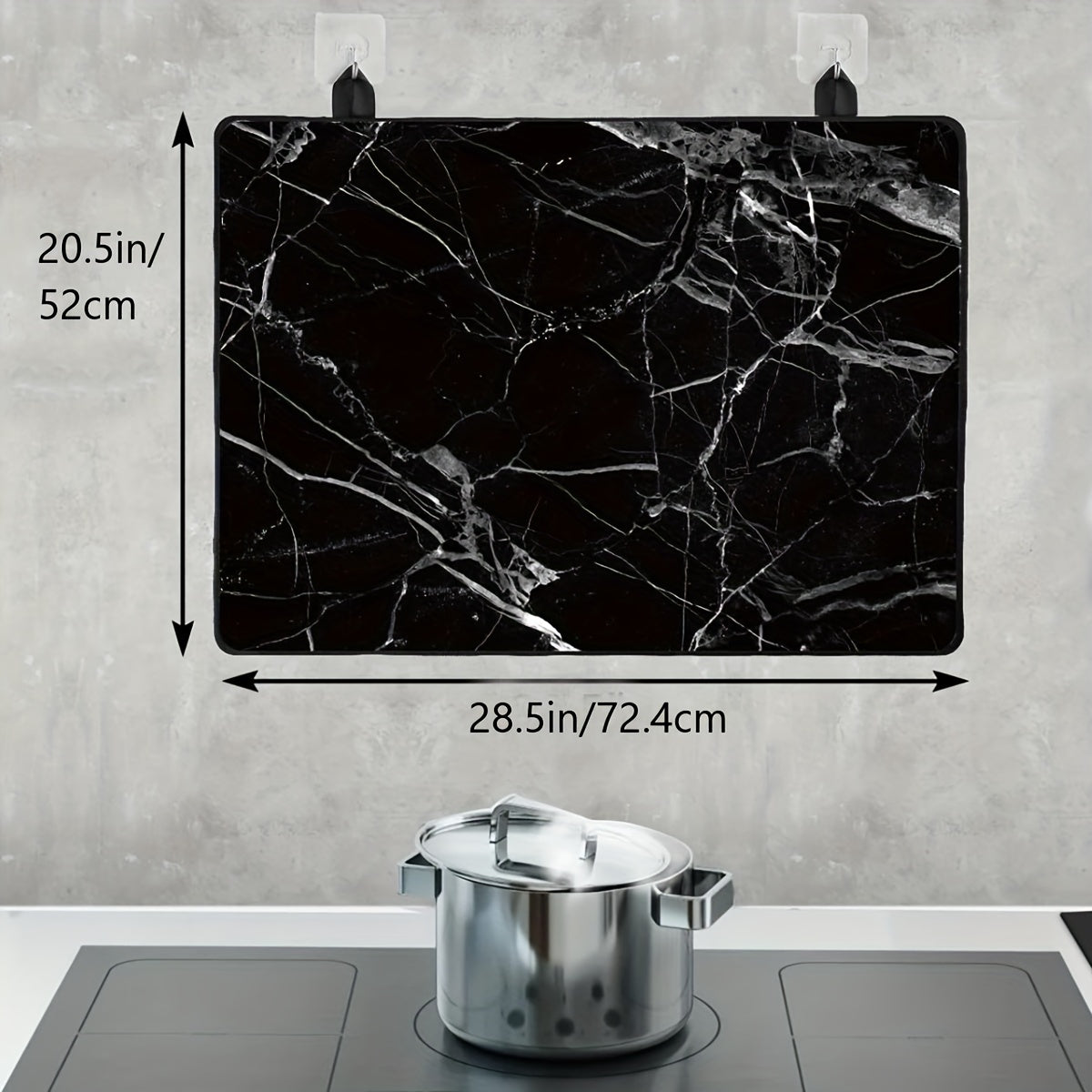 Protect your electric stove with this sleek Black Marble Stove Top Cover. Measuring 72.39x52.07cm, this heat-resistant glass protector is dishwasher safe and made from natural rubber. Perfect for your kitchen and dining area.