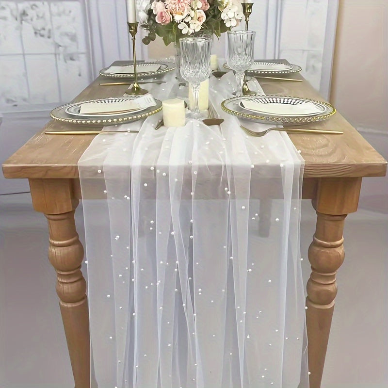 Enhance the ambiance of your special events with our Romantic Pearl Lace Table Runner. Perfect for weddings, bridal showers, and more, this elegant decoration is crafted from embroidered sheer chiffon tulle that is wrinkle-free for a luxurious look.