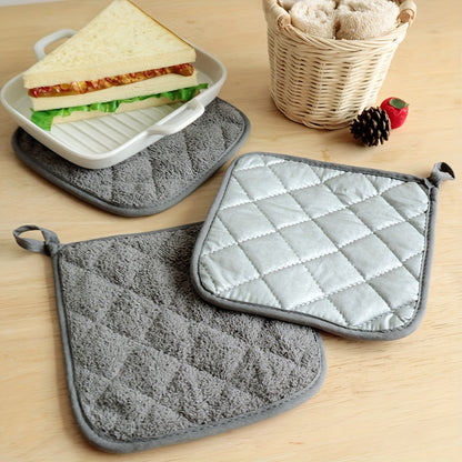 Kitchen set including 3 pieces of anti-scald towel cloth, insulation pads, microwave gloves, and pot mat. Made of silvery coated fabric in plain color.