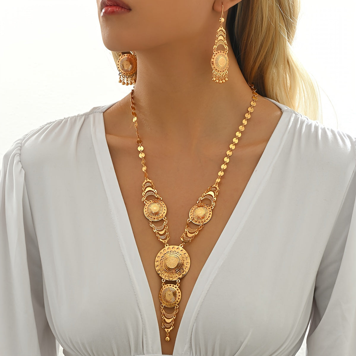 Retro Ramadan inspired copper gold plated necklace and earrings set featuring a creative sun flower design and tassel detail. Perfect for adding an elegant touch to women's party and wedding attire.