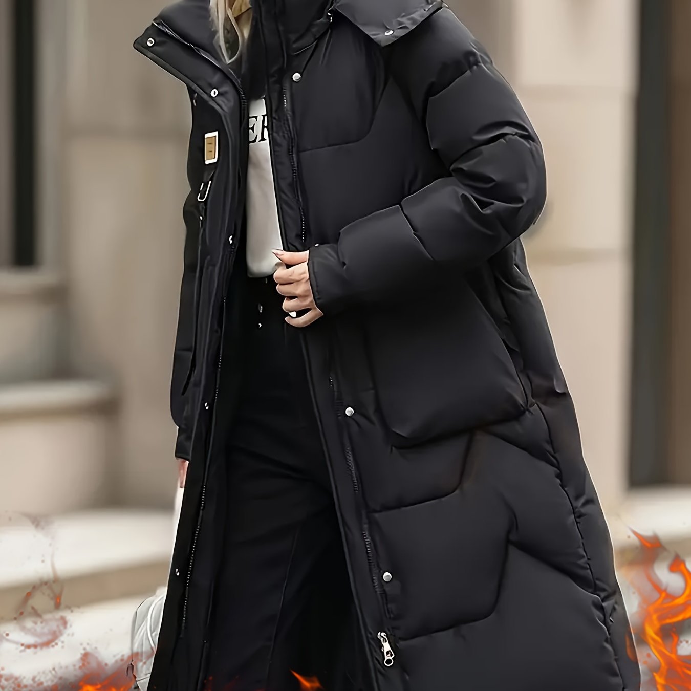 Stylish black mid-length quilted parka with detachable hood for women - ideal for staying warm and stylish during winter commuting and at home.