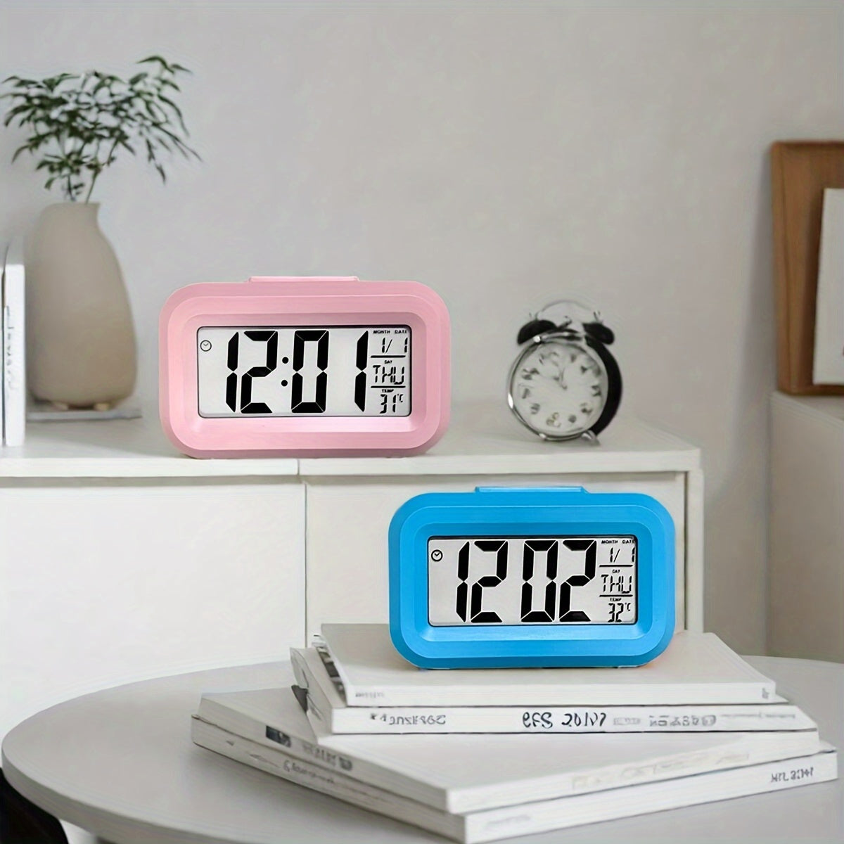 Compact pink mini LED desk clock with backlight, temperature, and calendar. Multifunctional kitchen timer for students. Sleek rectangular design with digital display. Battery-powered (AAA). Minimalist aesthetic.