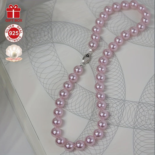 This stunning Cherry Blossom Pink Shell Pearl Necklace is crafted with hypoallergenic 925 Sterling Silver and features a vintage charm clasp. It makes the perfect gift for her and comes beautifully presented in an elegant gift box, making it ideal for