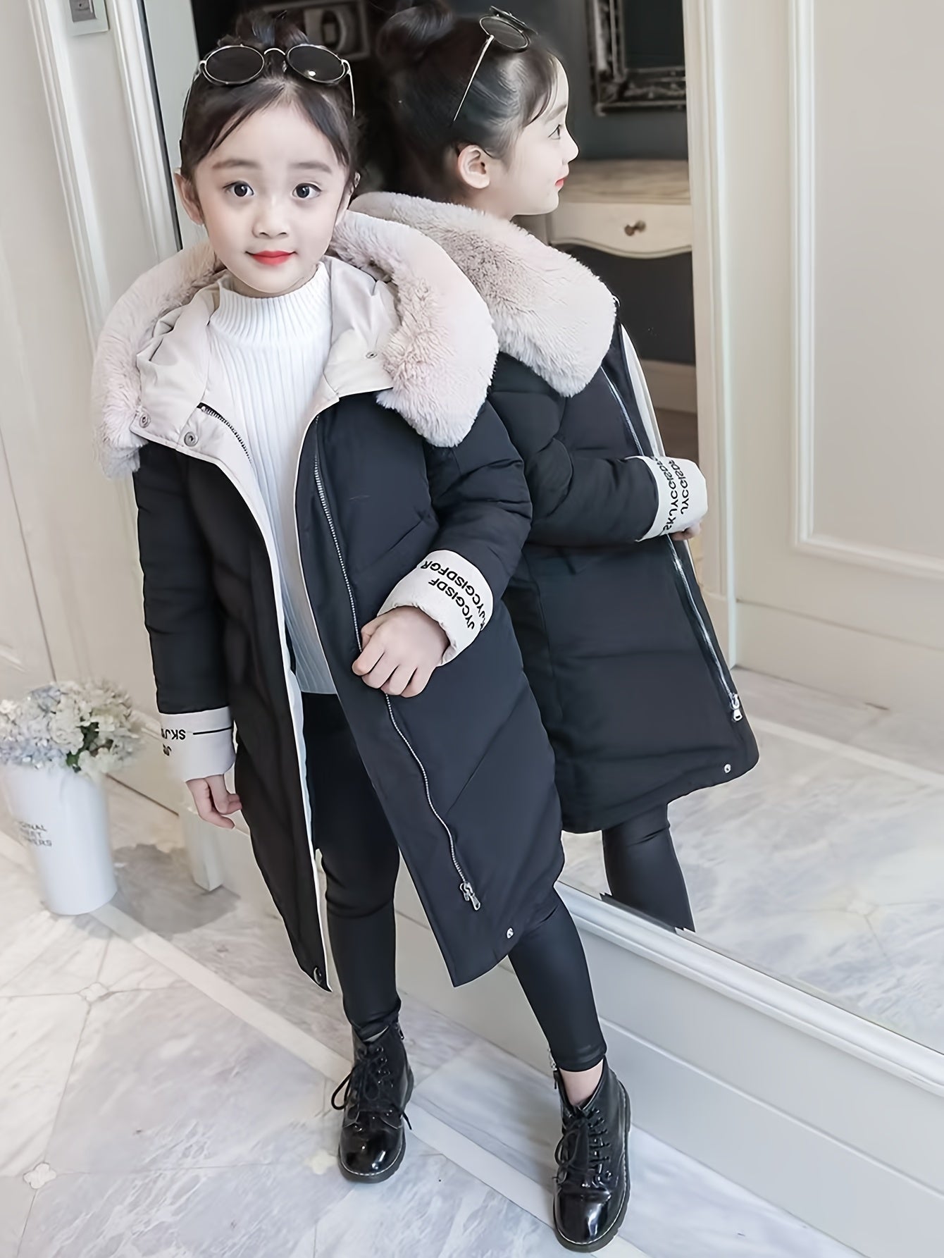 Girls' winter puffer coat with faux fur hood, embroidered alphabet detail, and casual skinny fit. Made of woven polyester, this thick warm jacket is perfect for cold weather.