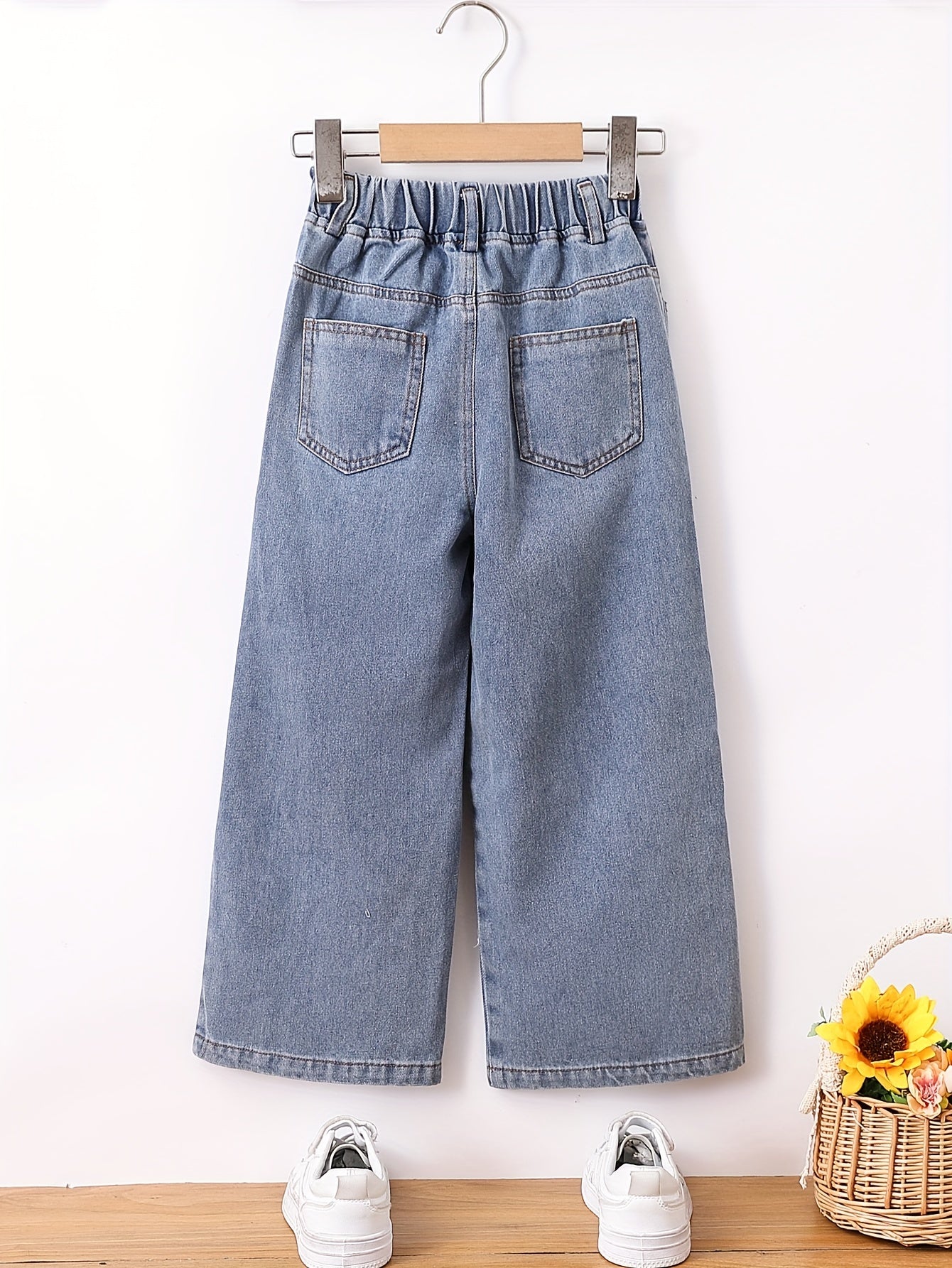 Girls' floral wide-leg denim jeans with elastic waistband, perfect for spring and autumn outdoor wear.