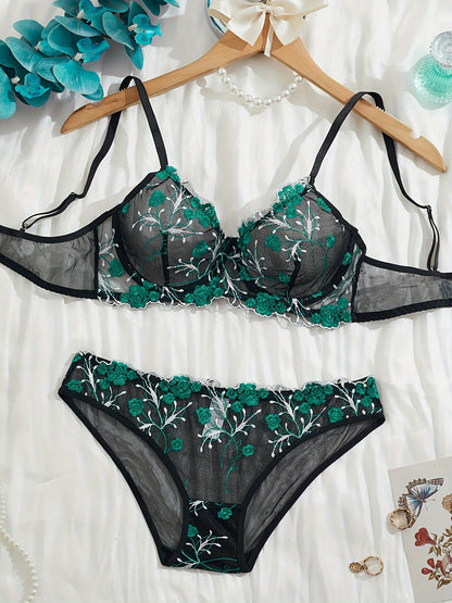 Elegant lace bra and panty set for women, featuring floral embroidery and knitted fabric. Perfect for adult intimate wear.