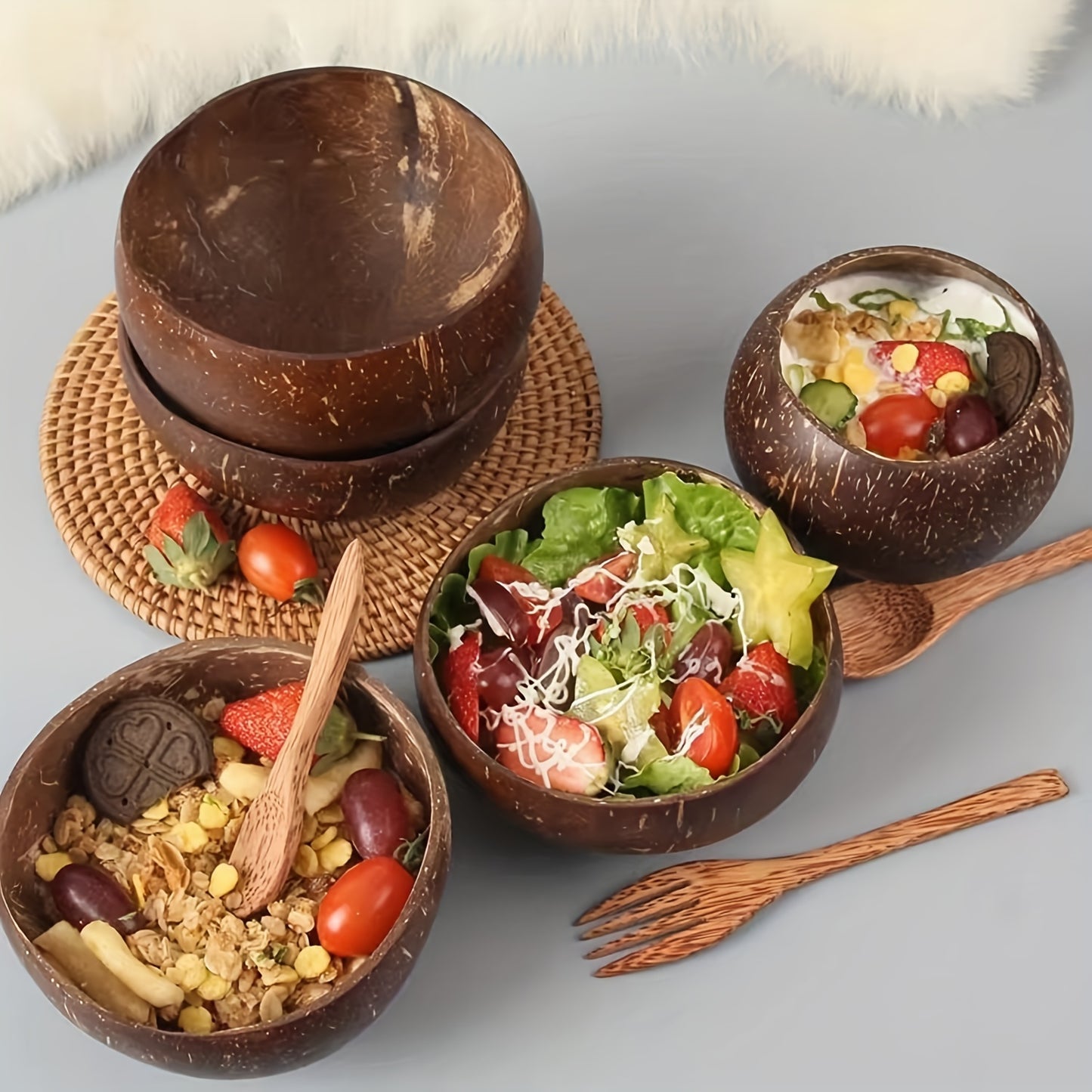 one set of 4: two coconut bowls, two wooden spoons, ideal for healthy vegetarian salads and ice cream, made from natural coconut.