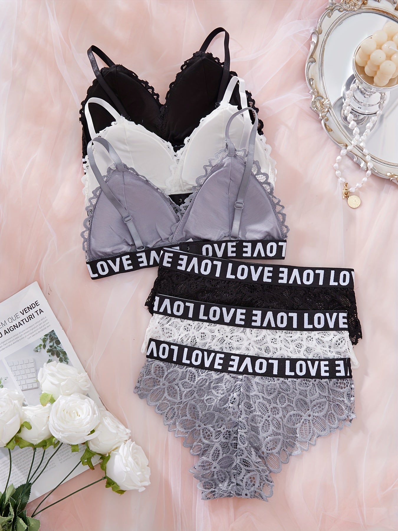 6-piece lace lingerie set for women featuring sporty and sexy wireless bra and panties with "LOVE" waistband. Made with breathable black and white floral lace for a comfortable fit.