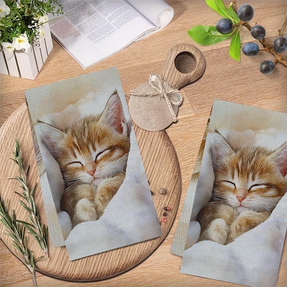 This collection includes 2 ultra-soft kitchen towels with a delightful design of a waking kitten, known for its gentle purring. These towels are highly absorbent, perfect for drying dishes, and can also be used as holiday decorations. They are machine