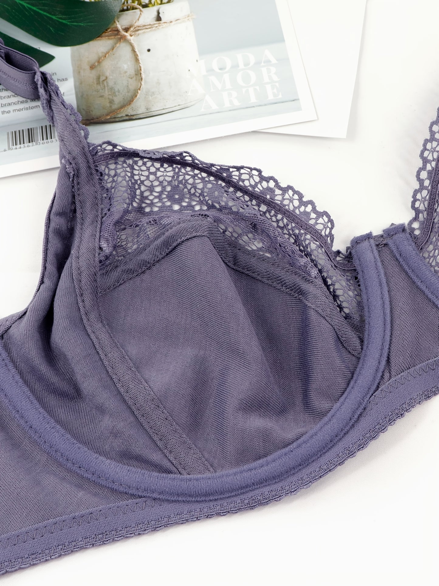 Floral lace bra for plus-size women, full coverage with underwire. Made of 85% Polyamide and 15% Elastane. Medium stretch knit fabric with contrast lace detail, no padding. Weighs 170 gsm.