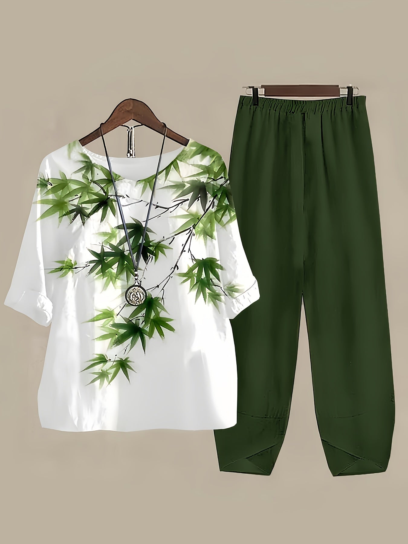 Bamboo print two-piece set: casual short sleeve t-shirt and fitted bottom pants for women.