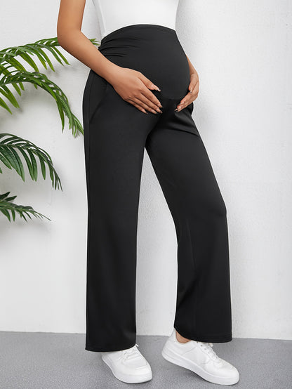 Chic maternity pants with high waist, slant pockets, and stretchy comfort for all seasons